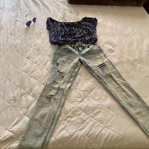 Distressed light wash jeans with butt enhancement